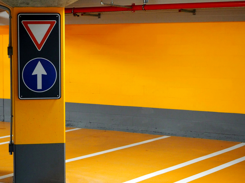 parking lot with parking signs